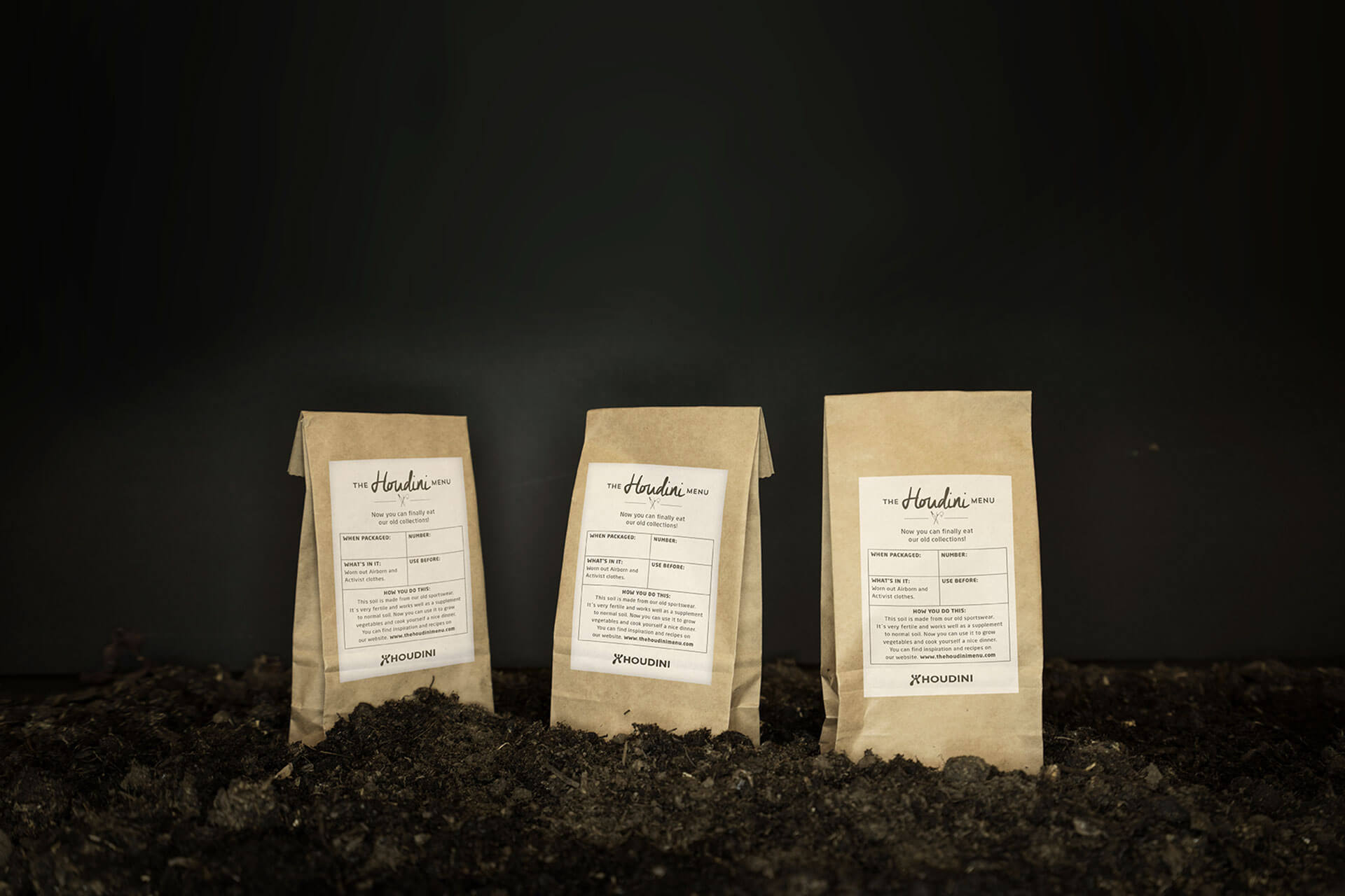 Three Houdini Menu bags of soil made from recycled clothing